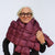 Woman wearing a quilted puffer scarf wrapped around neck and shoulders, front view