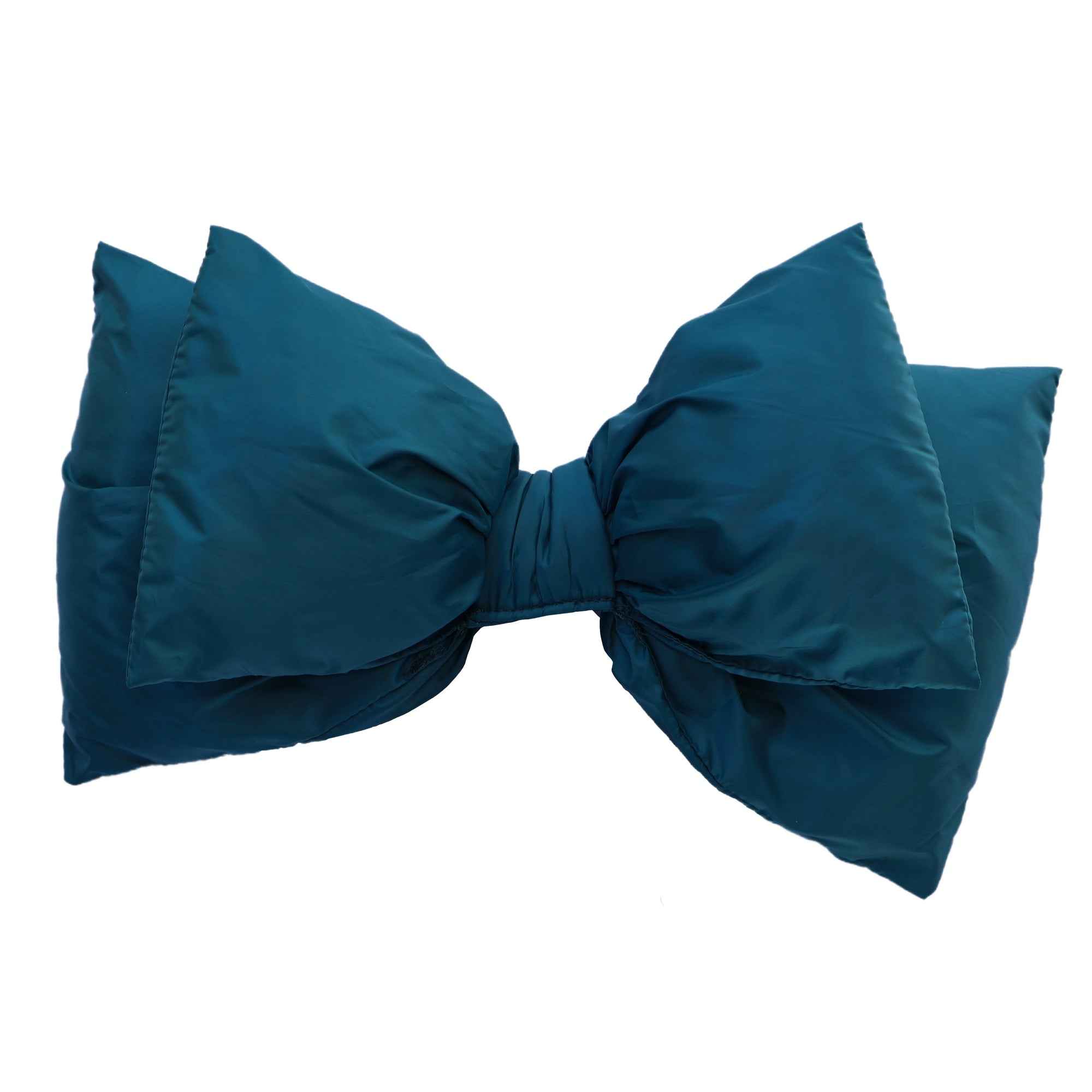 Large puffed teal bow accessory for ski helmet, studio shot on white background