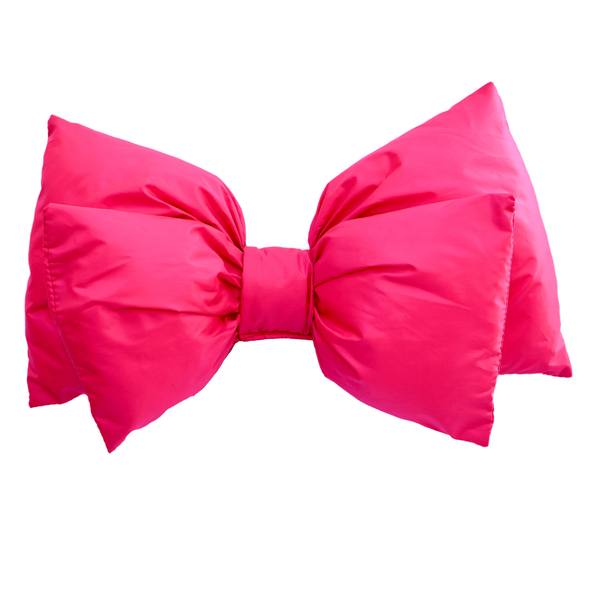 Oversized puffy bow-shaped ski helmet accessory in vibrant hot pink, front view