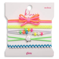 Set of five neon multicolor hair ties and bracelets with bow, beads, and star charm on card packaging