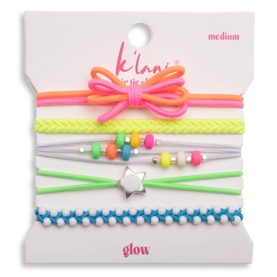 Set of five neon multicolor hair ties and bracelets with bow, beads, and star charm on card packaging