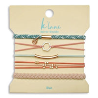 Set of five hair tie bracelets in pastel coral, mint, and nude with gold geometric charms