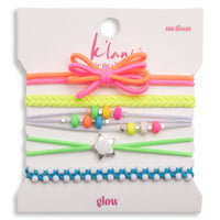 Set of five colorful hair ties and bracelets with beads, bow, star charm, and braided designs