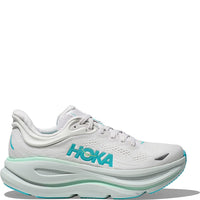 Light gray running shoe with teal accents and thick cushioned sole, side profile view