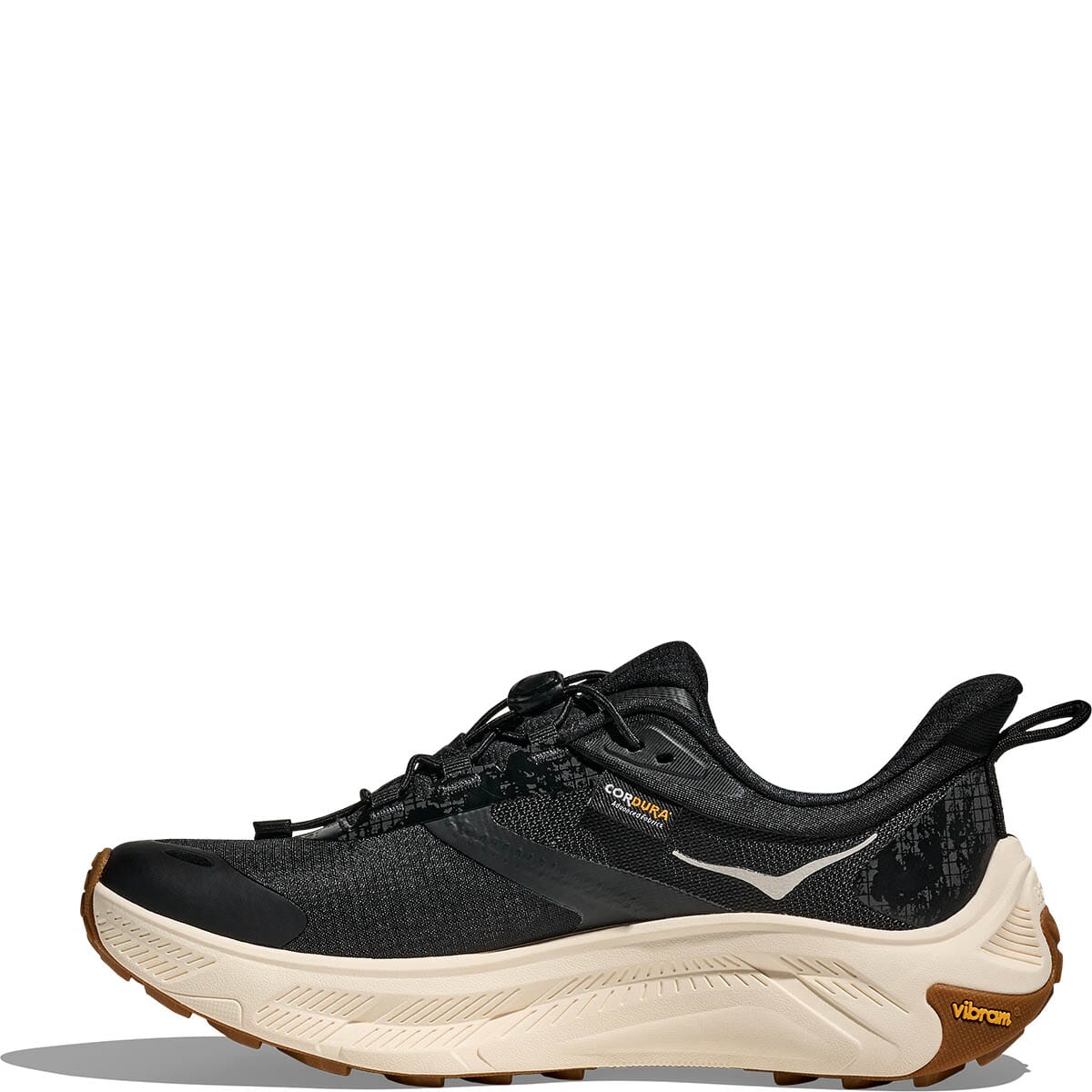 Black athletic running shoe with cream midsole and gum rubber outsole, side profile view