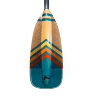Wooden canoe paddle with colorful chevron design and teal base, vertical studio shot