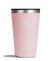 Light pink insulated tumbler with black lid and white logo, front view