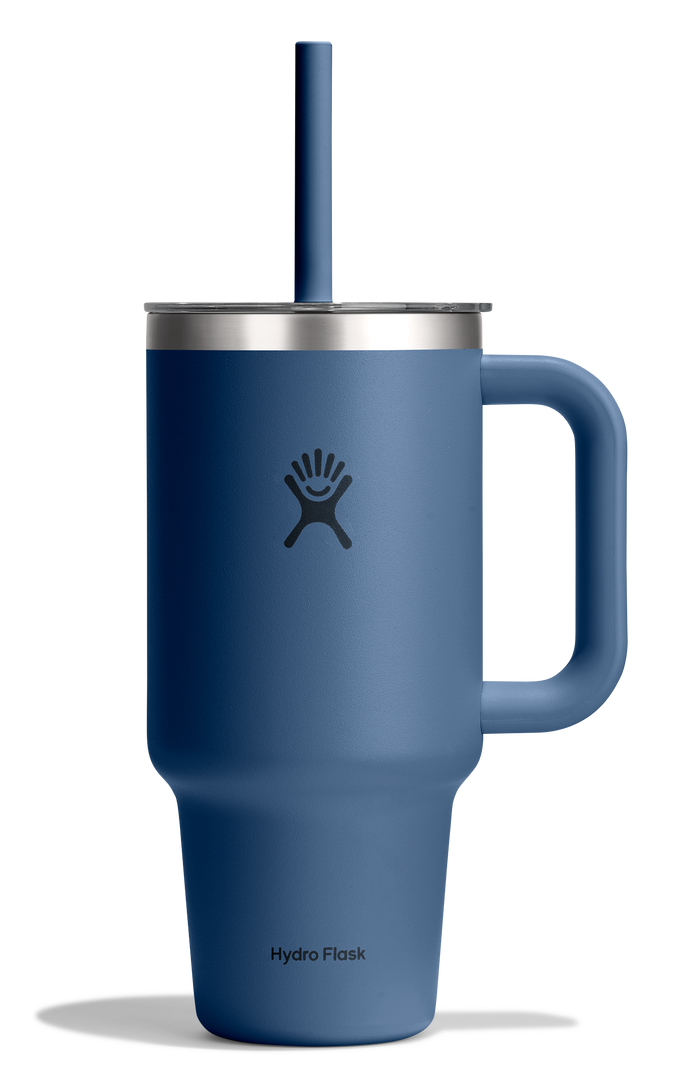 Large insulated travel tumbler with handle, straw lid, and matte blue finish, front view