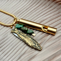 Gold brass purse charm with fish knife pendant, turquoise stones, and cylindrical whistle