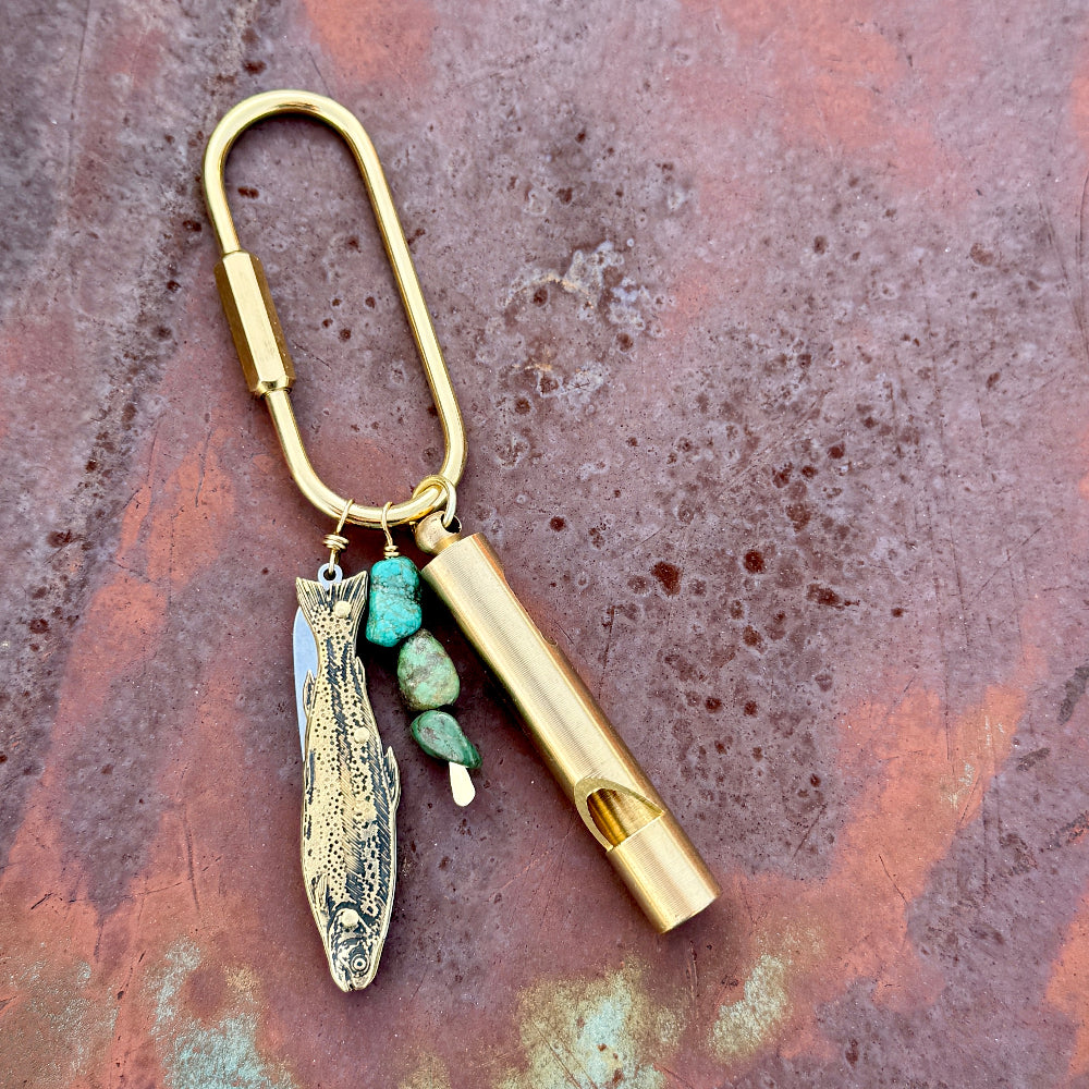Gold brass carabiner purse charm with fish pendant, turquoise stones, and cylindrical whistle