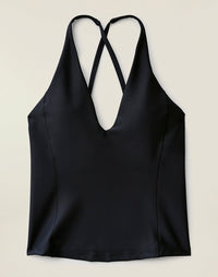 Black compression tankini top with crossed back straps and deep V-neck, front view
