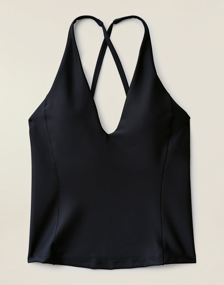 Black compression tankini top with crossed back straps and deep V-neck, front view