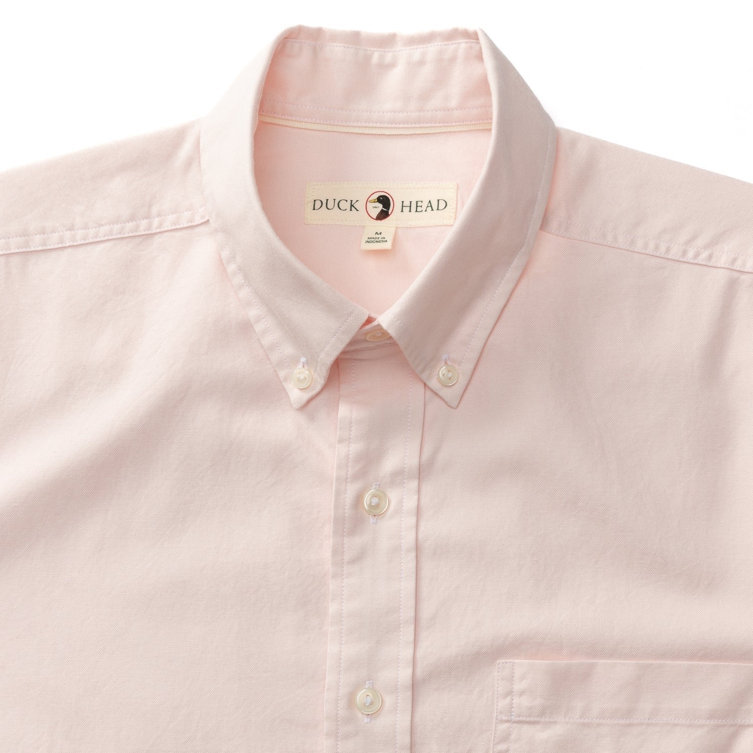 Light pink long sleeve cotton oxford shirt with button-down collar and chest pocket