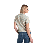 Women's short sleeve button-up shirt with small floral pattern, shown from back view