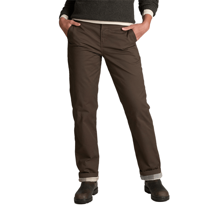 Women's lined chino pants in dark brown with rolled cuffs, front view on model