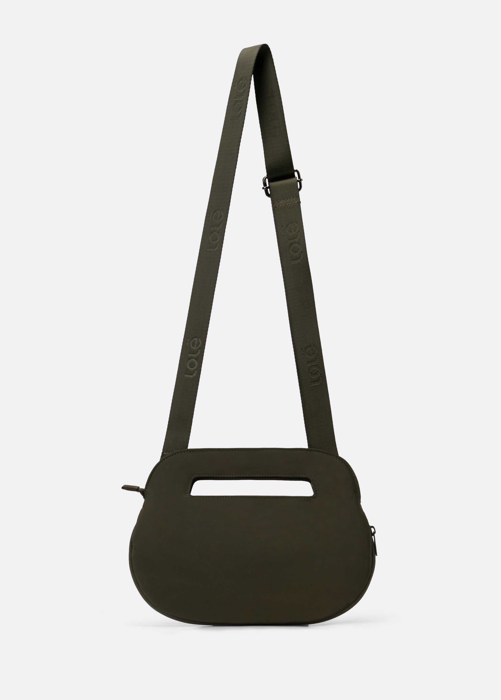 Olive green crossbody bag with long adjustable strap and oval shape, back view