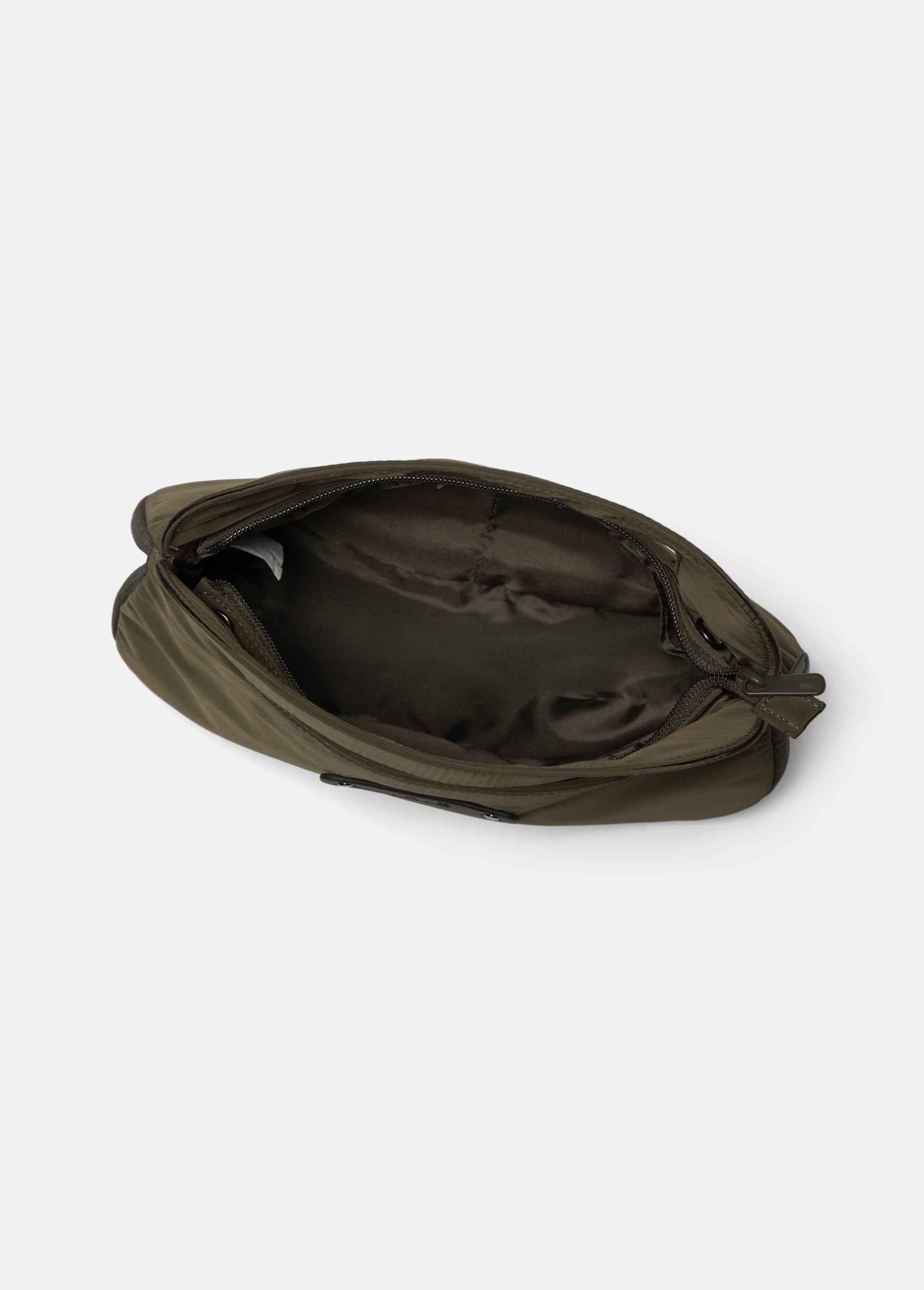 Olive green crossbody bag open top view showing dark interior lining and zipper
