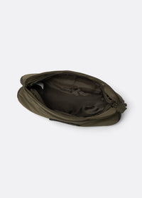 Olive green crossbody bag open top view showing dark interior lining and zipper