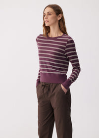 Women's striped long sleeve pullover top in purple with white stripes, front three-quarter view