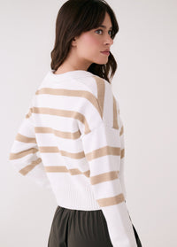 Striped knit sweater with white and beige horizontal stripes, three-quarter back view
