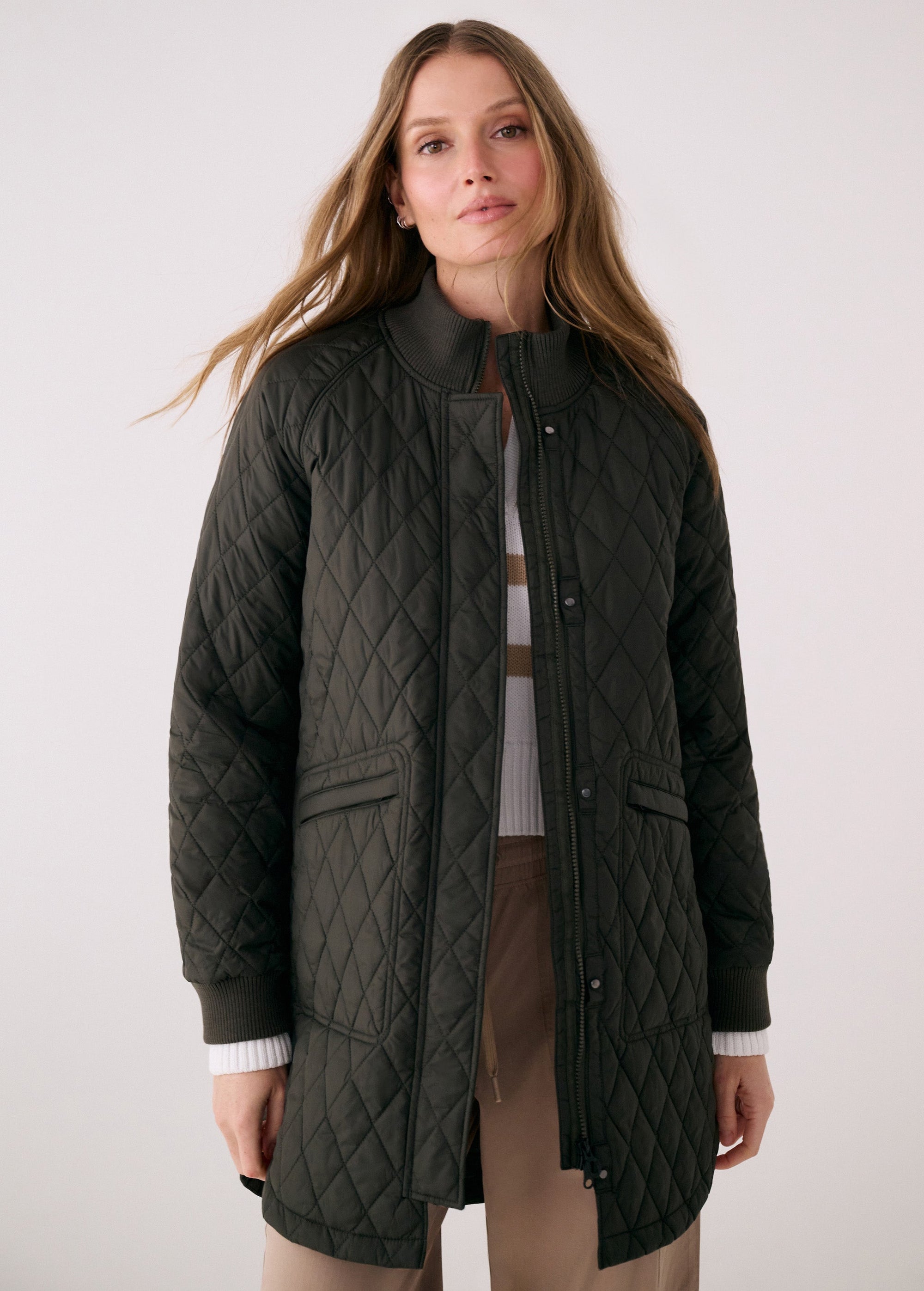 Women's quilted 3/4 length bomber jacket in dark olive, open front view on model