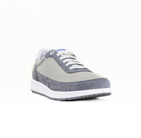 Gray and beige casual sneaker with white laces and sole, side profile view