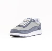 Gray and beige casual sneaker with white laces and sole, side view