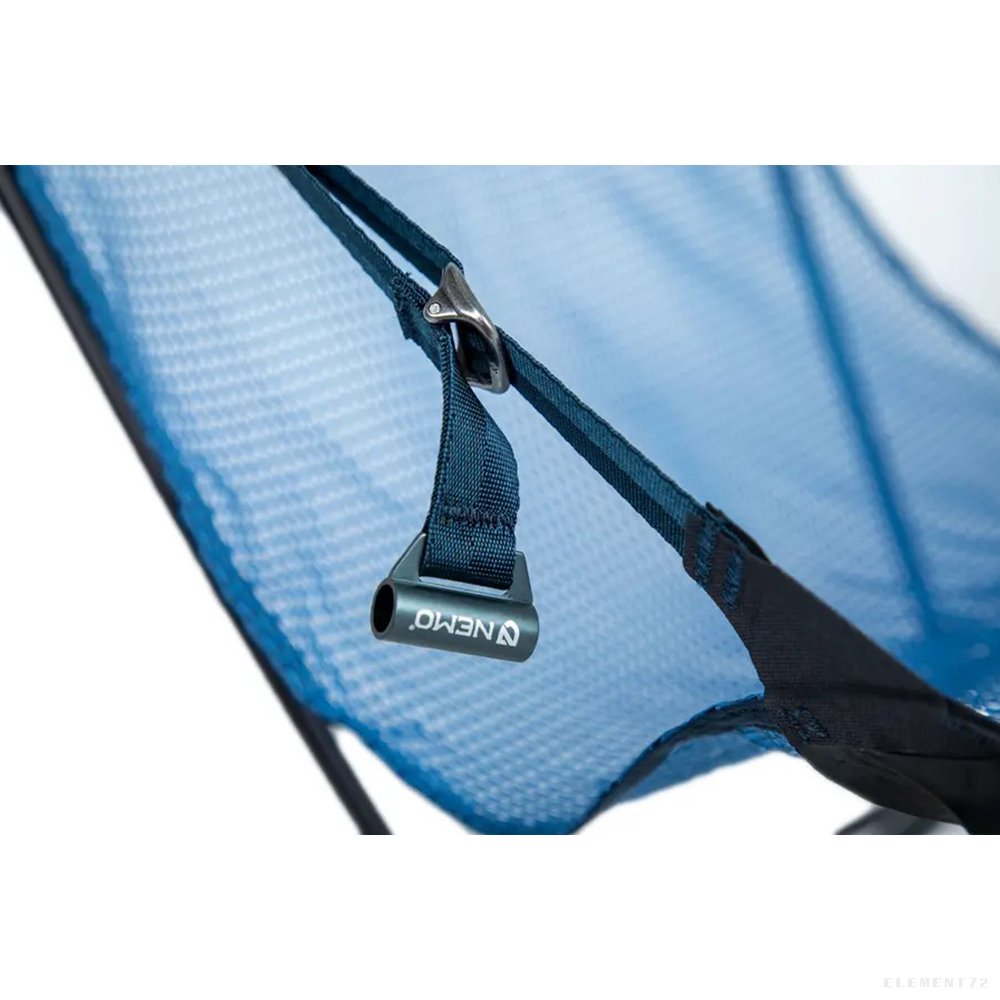 Close-up detail of blue reclining camp chair showing adjustment strap and hardware