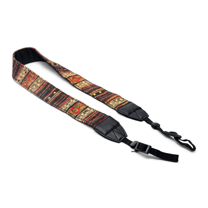 Woven tapestry camera strap with geometric ethnic pattern, black buckle clips and leather ends