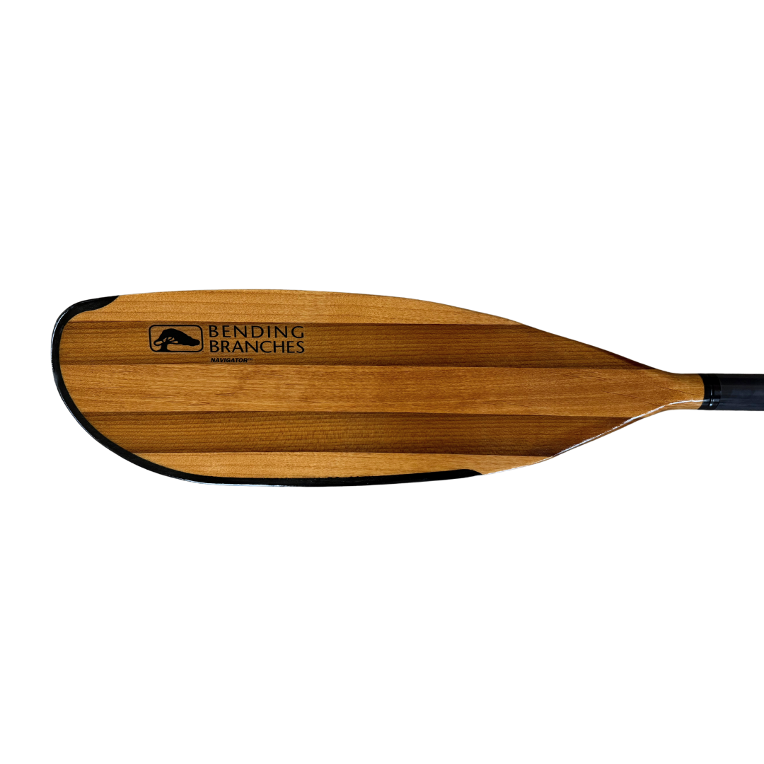 Wooden kayak paddle blade with black trim shown from front view