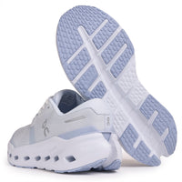 Light gray and white running shoes with perforated sole, shown from side and bottom view