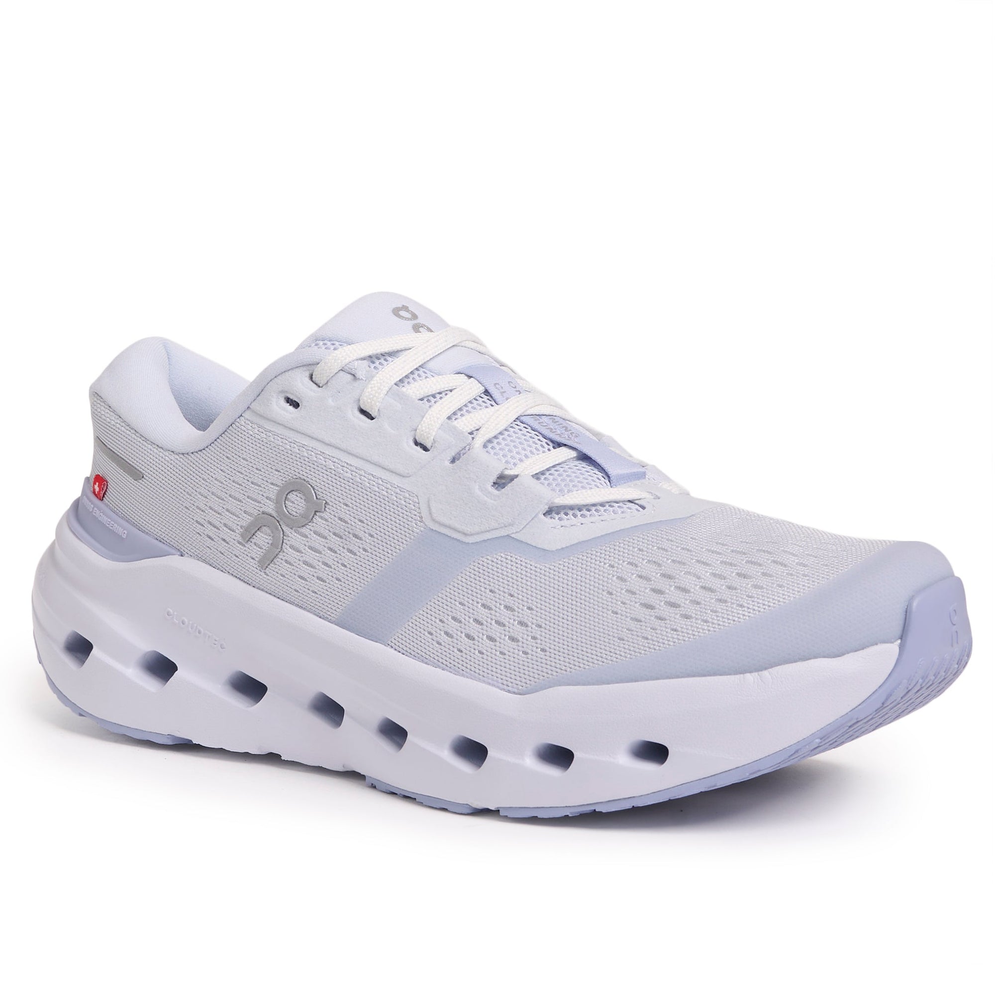 Light purple running shoe with mesh upper and white sole featuring ventilation holes, side view
