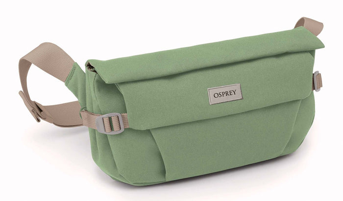 Sage green canvas hip bag with roll-top flap, beige adjustable crossbody strap, front view