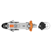 Telemark ski binding shown from above, featuring orange pivot mechanism and metal heel piece