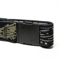 Camouflage patterned webbing belt with black plastic buckle, close-up detail view
