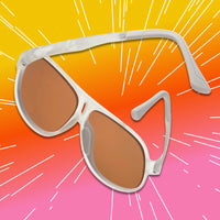 Aviator-style sunglasses with white marble frame and amber lenses, angled product view