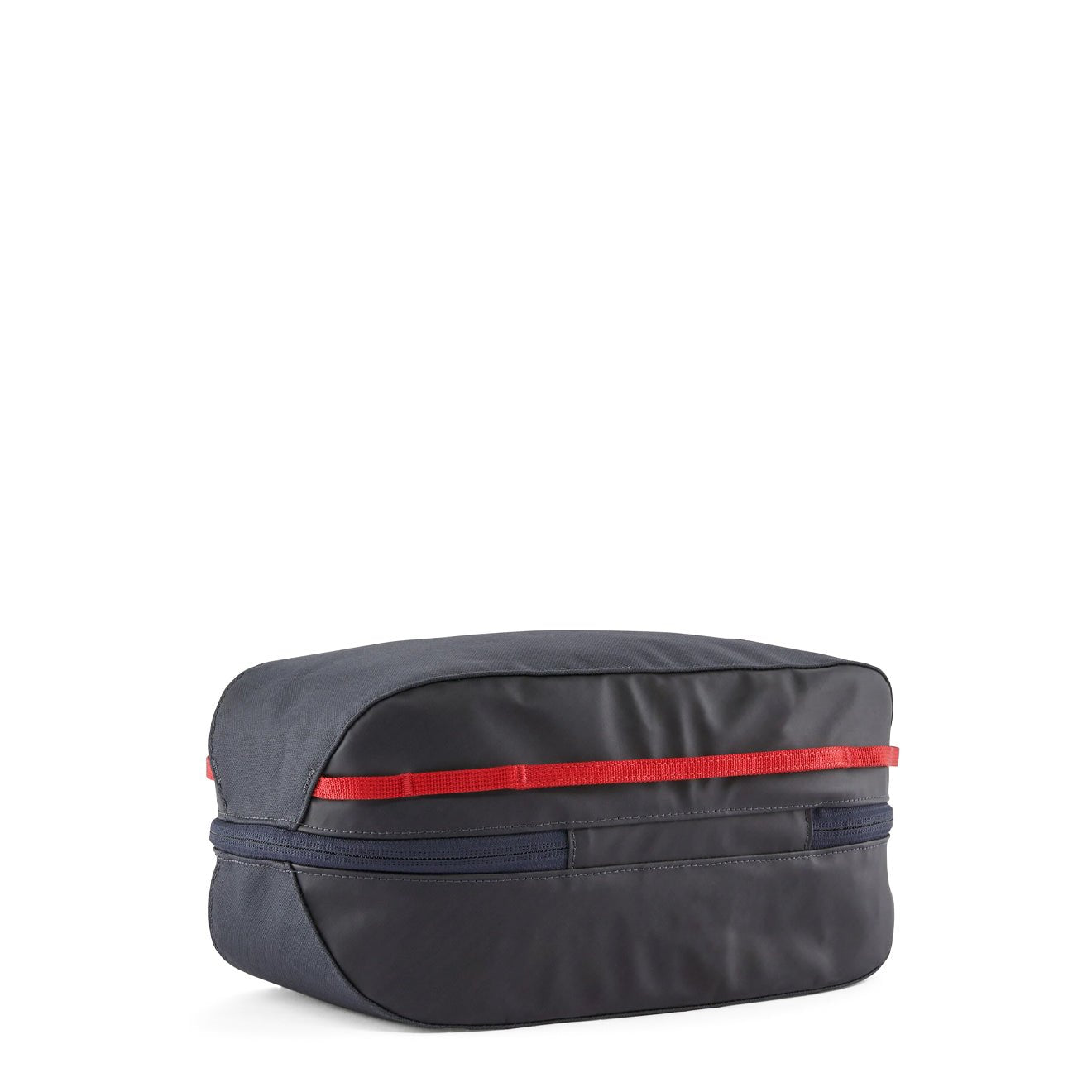 Dark blue rectangular travel cube bag with red zipper pull and zipper closure, angled view