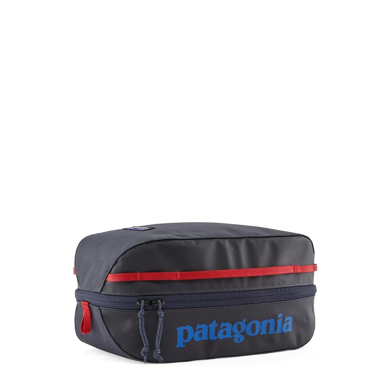 Small rectangular travel packing cube with red zipper stripe, three-quarter front view