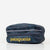 Dark blue travel cube bag with zipper closure, grab handle, and yellow brand logo, front view