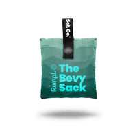 Compact stuffed teal ombre sack with mountain print, black snap strap, and hanging loop