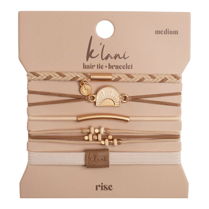 Set of five hair tie bracelets in beige and gold tones on branded packaging card