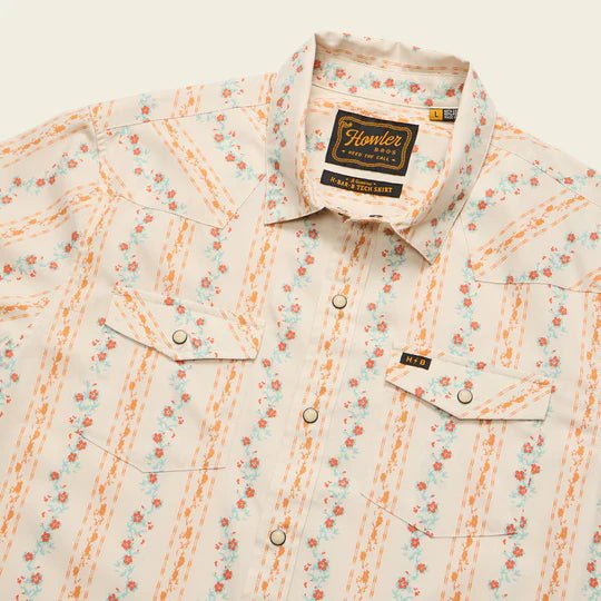 Men's western snap shirt in floral stripe pattern with pearl snaps, chest pockets, angled front view