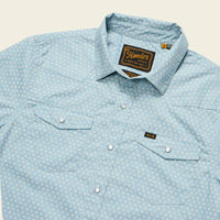 Light blue Western snap shirt with small floral print, dual chest pockets, angled front view