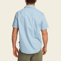 Men's short-sleeve button-up shirt with small floral print, back view on model