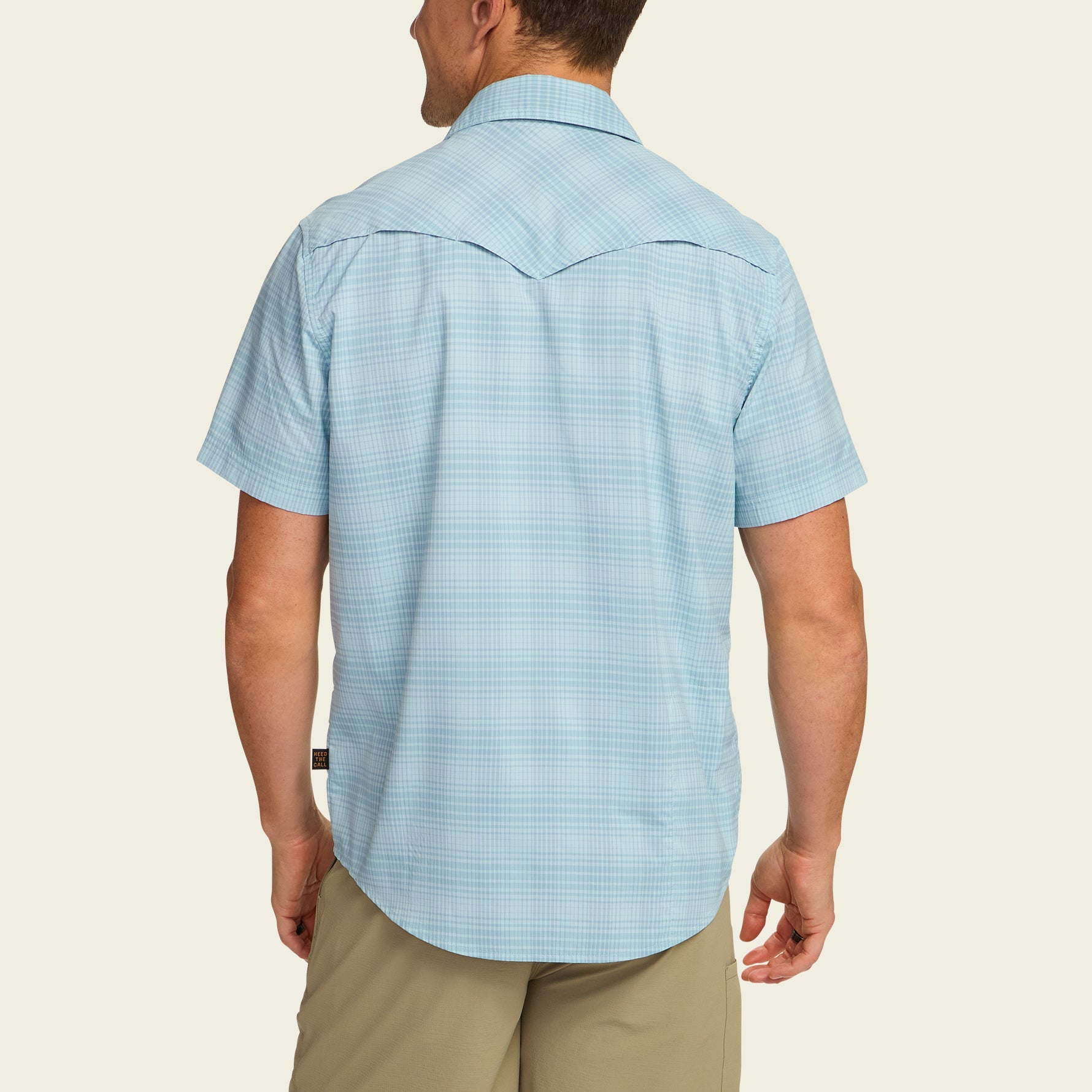 Light blue checkered short-sleeve button-up shirt shown from back view on male model
