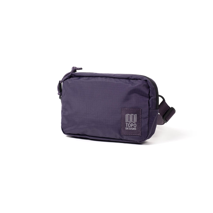 Deep purple ripstop belt bag with zipper closure and adjustable strap, angled view