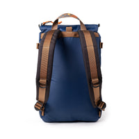 Navy blue backpack with brown straps shown from back, displaying shoulder straps and buckle details