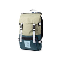 Two-tone hiking backpack with olive green top, teal bottom, white straps and buckles