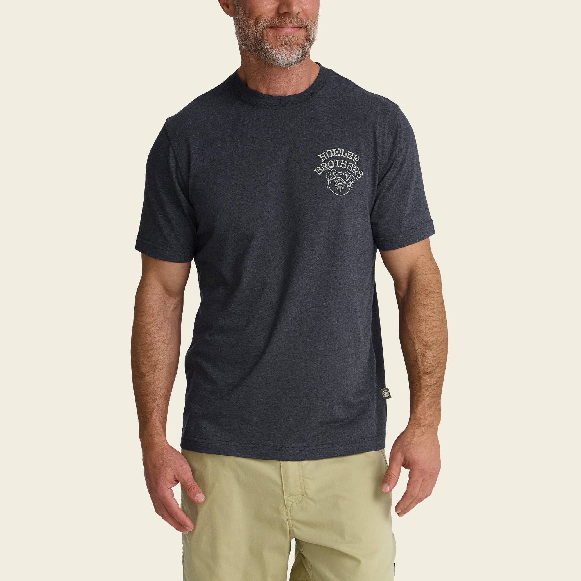 Dark navy heathered t-shirt with small chest logo worn by bearded man