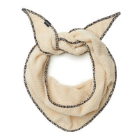 Cream fleece scarflette tied in a knot with leopard print trim edging, flat lay view